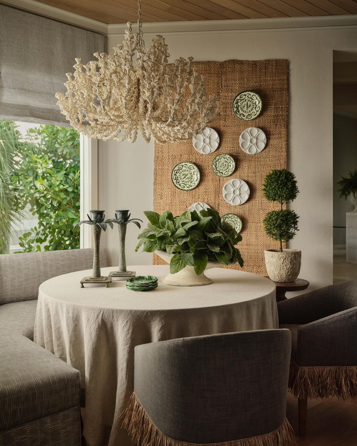 12 Bohemian Chic Dining Room Ideas for Effortless Style 12 Bohemian chic dining room with a linen table, organic chandelier, and woven wall art.