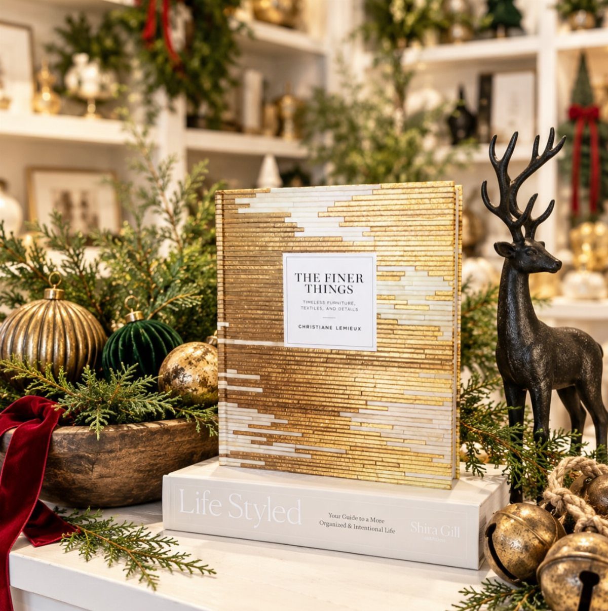 15 Christmas Coffee Table Decor Ideas for a Festive Home 8 Stacked coffee table books as a base for gold ornaments and evergreen branches.