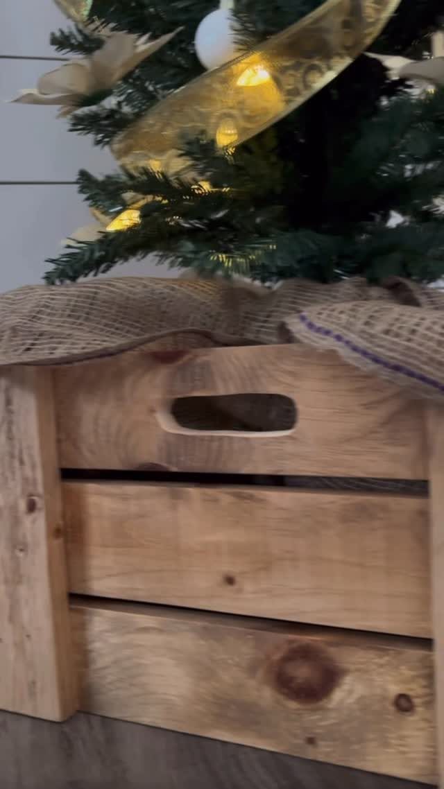 20 Christmas Decorations to Make at Home in 2026 18 Wooden crate Christmas tree stand with burlap fabric and decorated tree above