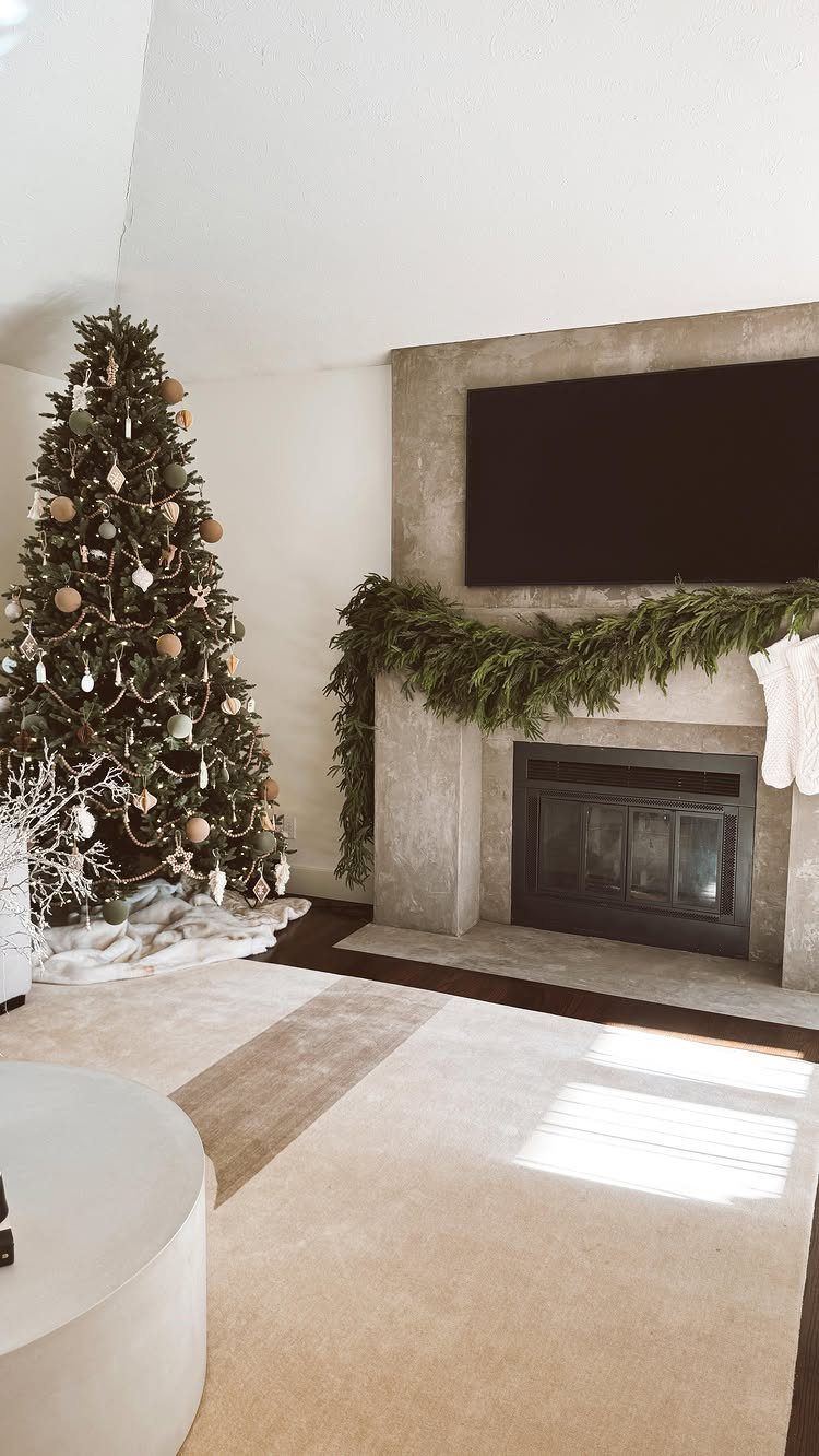 23 Christmas House Decorations Ideas for a Festive Home 11 Christmas tree and fireplace mantel decorated with a cohesive gold and green color palette.
