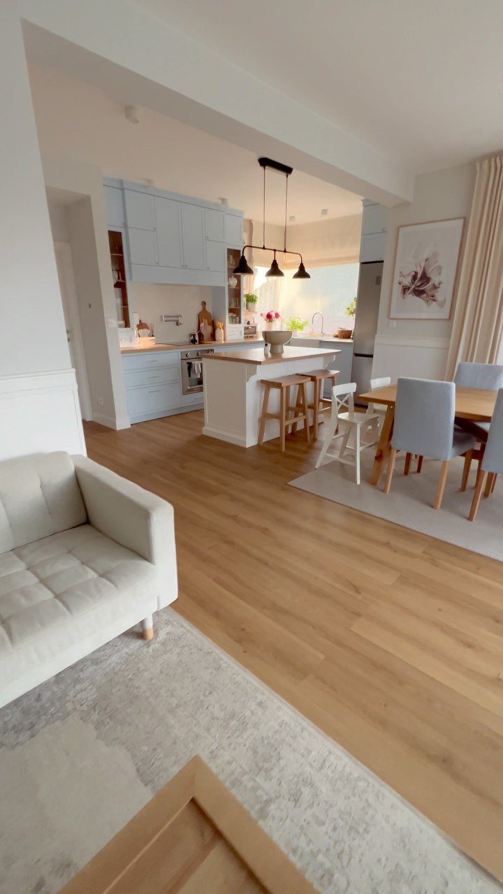 13 Contemporary Dining Room Decor Ideas for 2026 12 Open concept living space integrating a kitchen, dining area, and living room lounge.