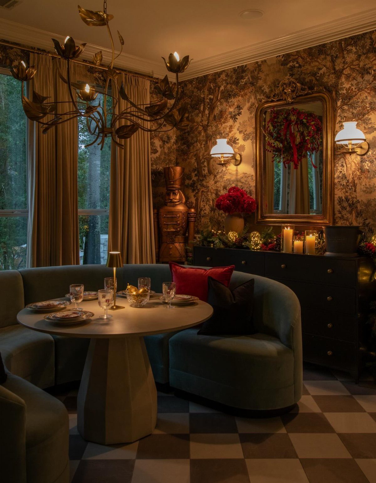 11 Dark Academia Dining Room Ideas for Moody Elegance 11 Dining room with floral wallpaper, gold chandelier, and curved blue banquette seating.