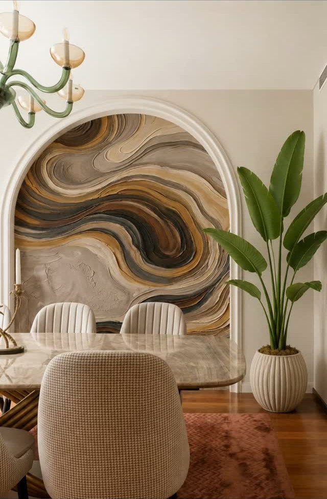 15 Dining Ideas for Small Spaces That Maximize Every Inch 6 Large abstract swirling painting inside an arched wall niche in a dining room