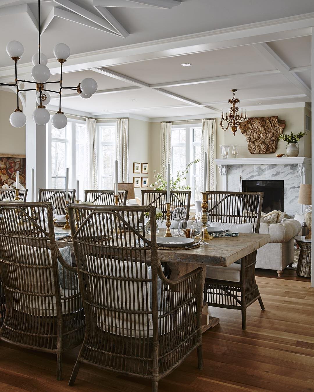 10 Dining Room Decorating Ideas for 2027 That Feel Fresh 3 Rustic reclaimed wood dining table with woven wicker chairs in a bright room