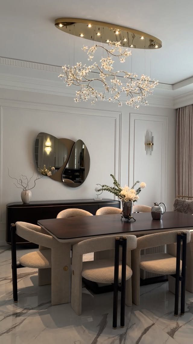 10 Dining Room Grey Wall Ideas for a Refined Look 3 Dining room with grey walls, marble flooring, and a gold ceiling light fixture.