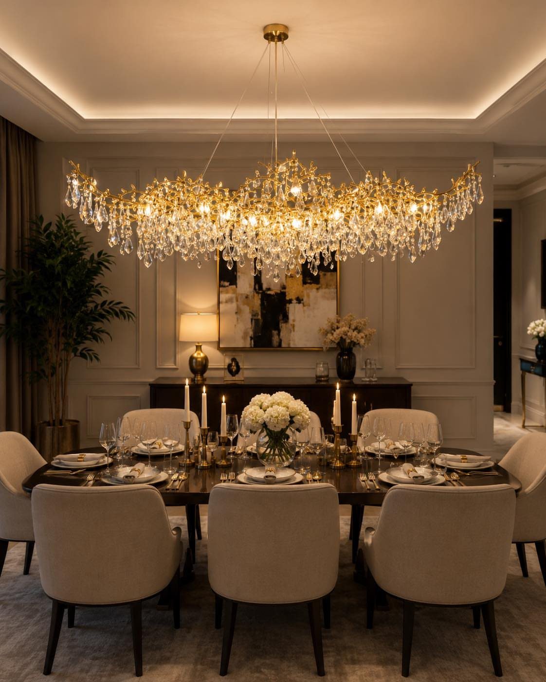 7 Dining Room Table Ideas for a Standout Space 2 Ornate crystal chandelier hanging over a set rectangular dining table with beige chairs.
