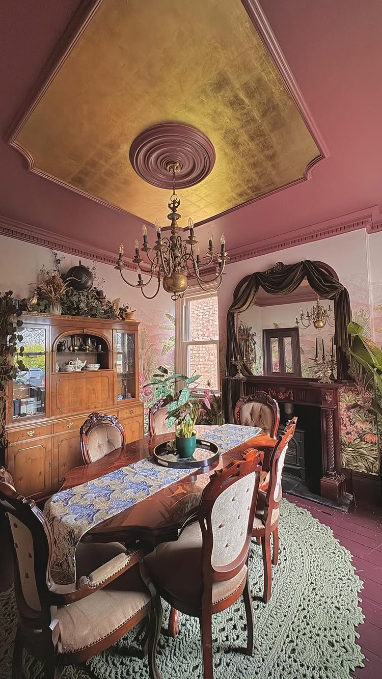 11 Dining Room Tray Ceiling Ideas with Photos 8 Gold leaf tray ceiling with a chandelier over a formal dining room set