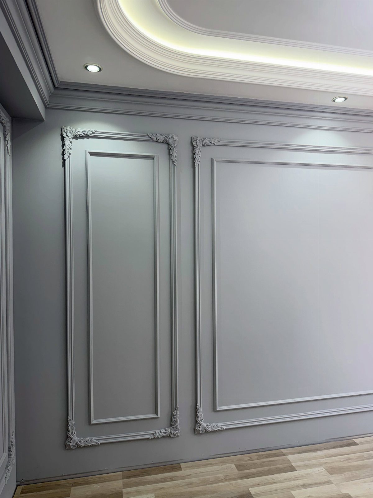 11 Dining Room Tray Ceiling Ideas with Photos 3 Curved tray ceiling with crown molding and cove lighting in a grey room