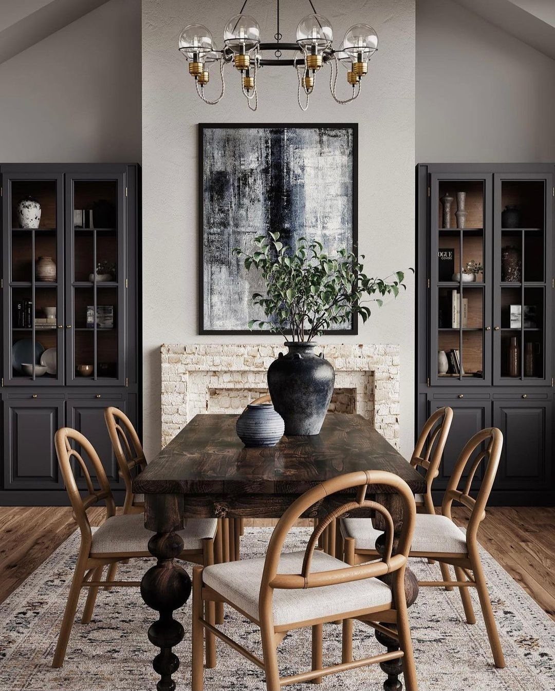 10 Dining Table in Living Room Ideas for Small Spaces 7 Dark wood dining table with curved chairs in a room with black cabinets.