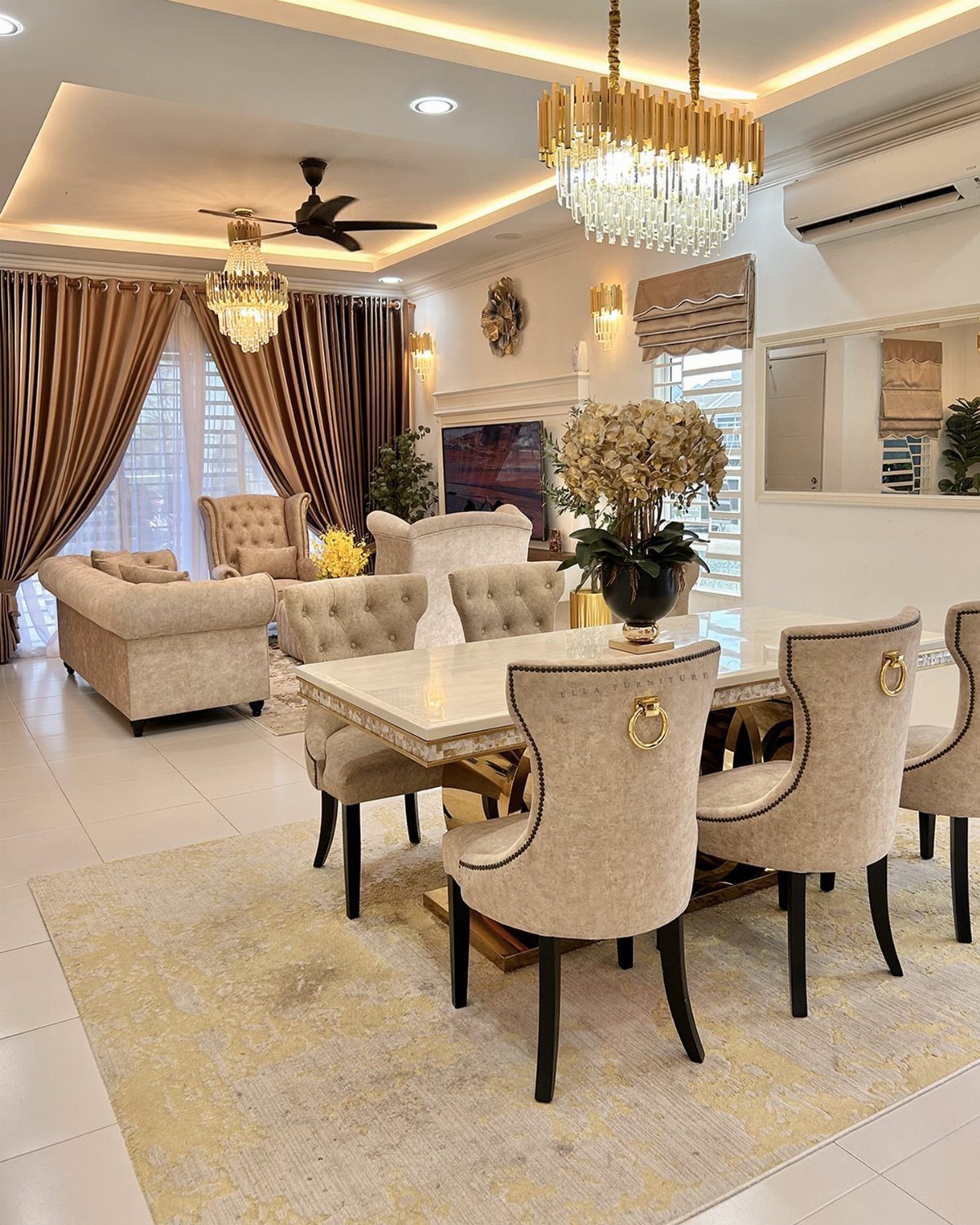 7 Dining Table with Mismatched Chairs Ideas That Work 1 White marble dining table with matching beige upholstered chairs in a luxury room.