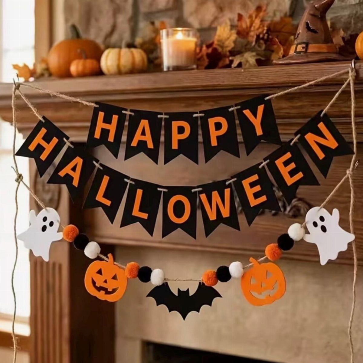 16 Fall Fireplace Mantel Decor Ideas with Photos 7 Halloween banner and garlands hanging on a wooden fireplace mantel with pumpkins.