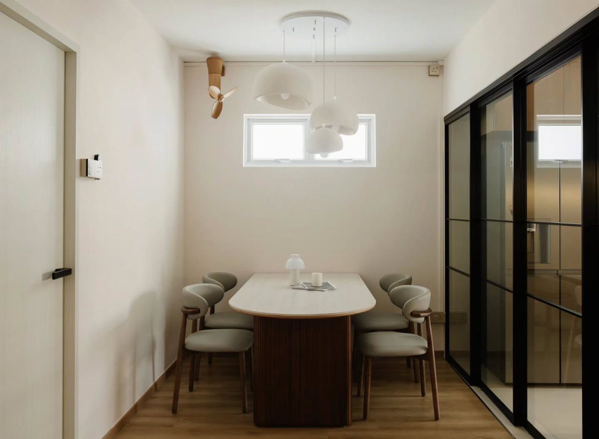 8 Feng Shui Dining Room Ideas for Balance and Flow 8 Minimalist dining room with oval white table, grey chairs, and black glass doors.