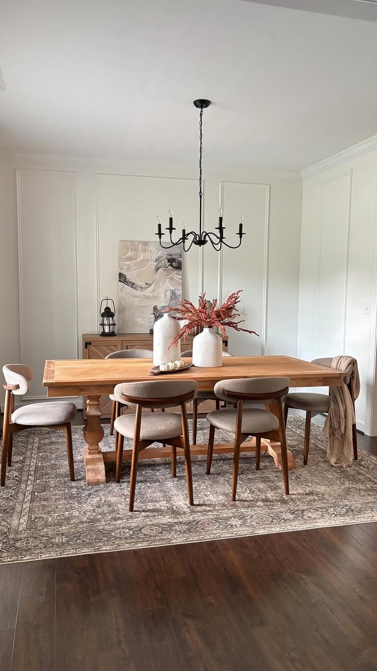 13 Formal Dining Room Ideas for an Elegant Space 1 Grey upholstered dining chairs around a light wood table in a bright room