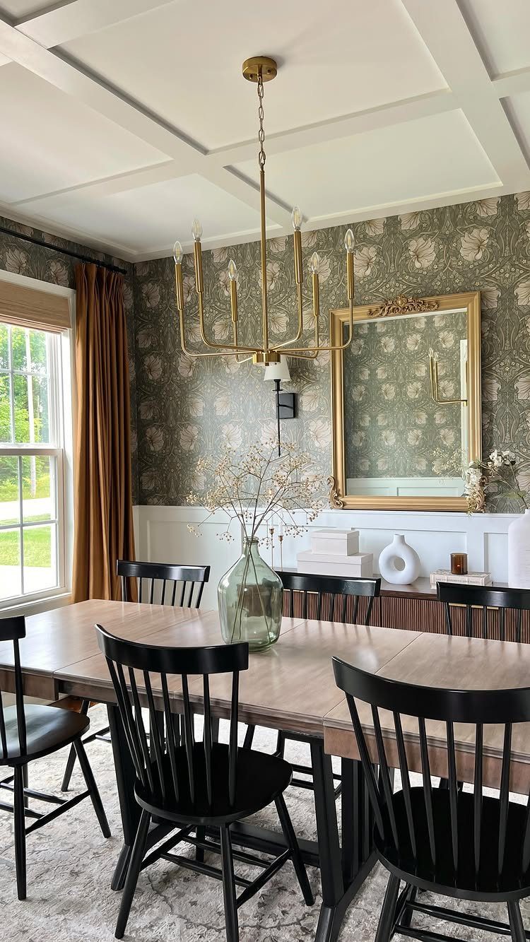 13 Formal Dining Room Ideas for an Elegant Space 6 Dining room with floral wallpaper, wooden table, black chairs, and gold chandelier.