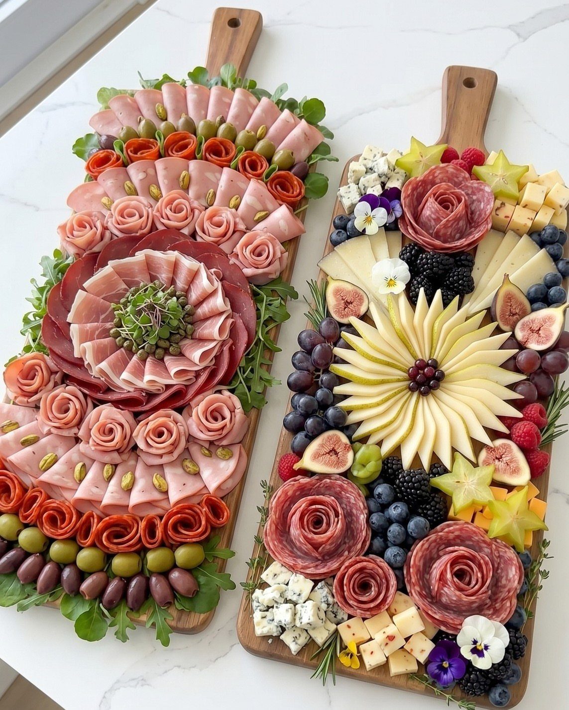 6 Formal Dining Table Decor Ideas for an Elegant Setting 4 Two wooden charcuterie boards featuring meats and cheeses arranged as decorative floral patterns.