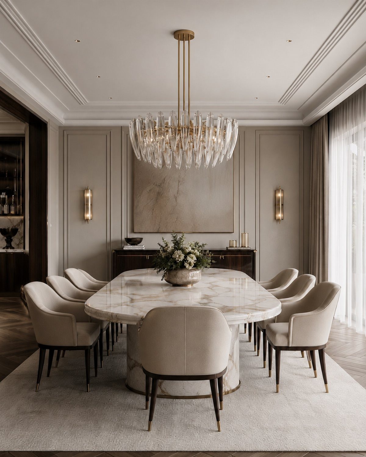 13 Modern Elegant Dining Room Ideas with Photos 9 Oval marble dining table with beige chairs and a crystal chandelier in neutral room.