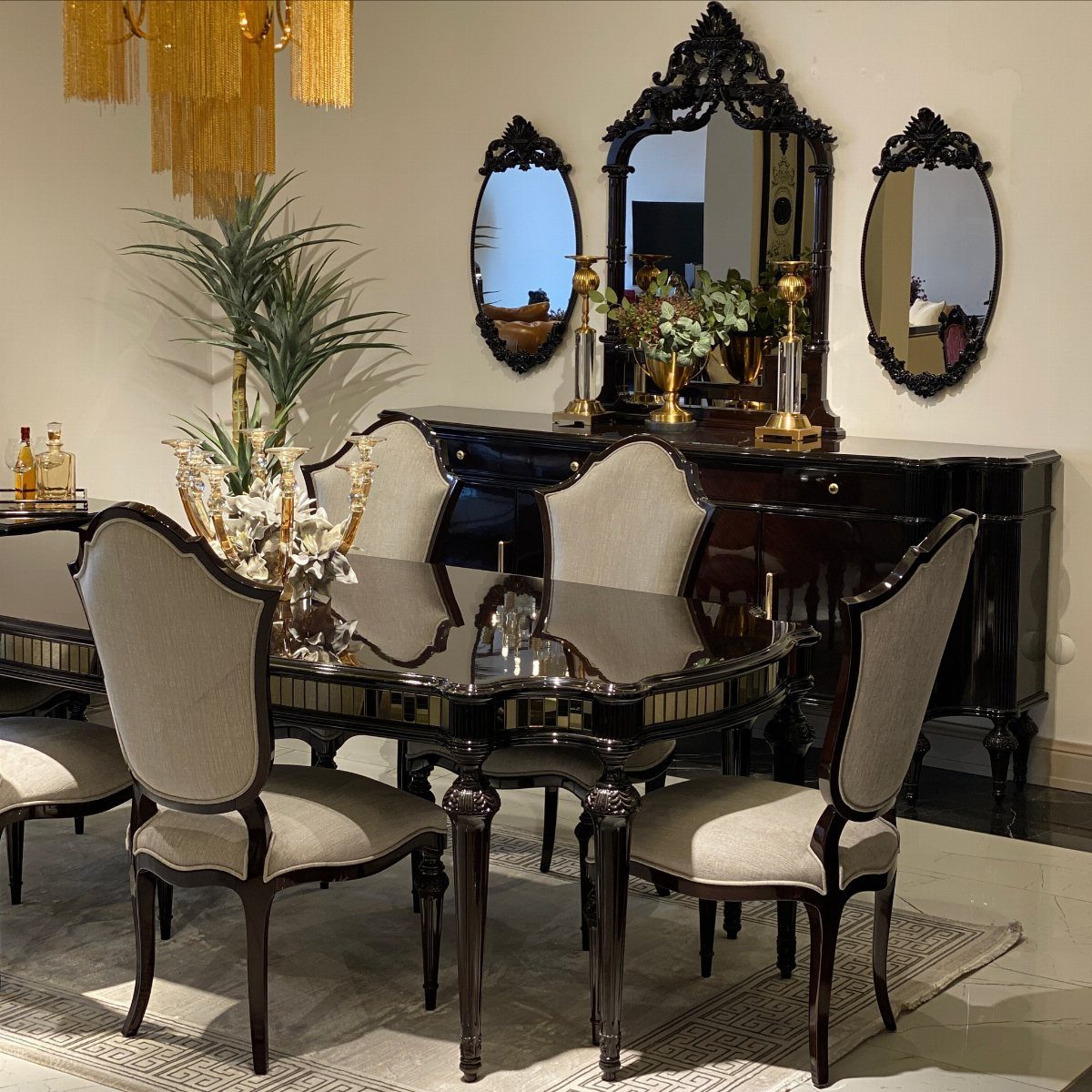 23 Modern Luxury Dining Room Ideas with Photos 16 Ornate dark wood dining set with beige chairs and carved black wall mirrors.