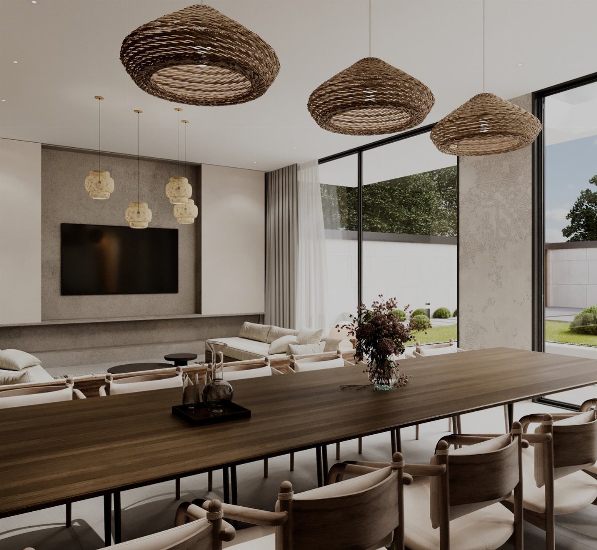 Long wooden dining table with woven pendant lights in a bright minimalist room