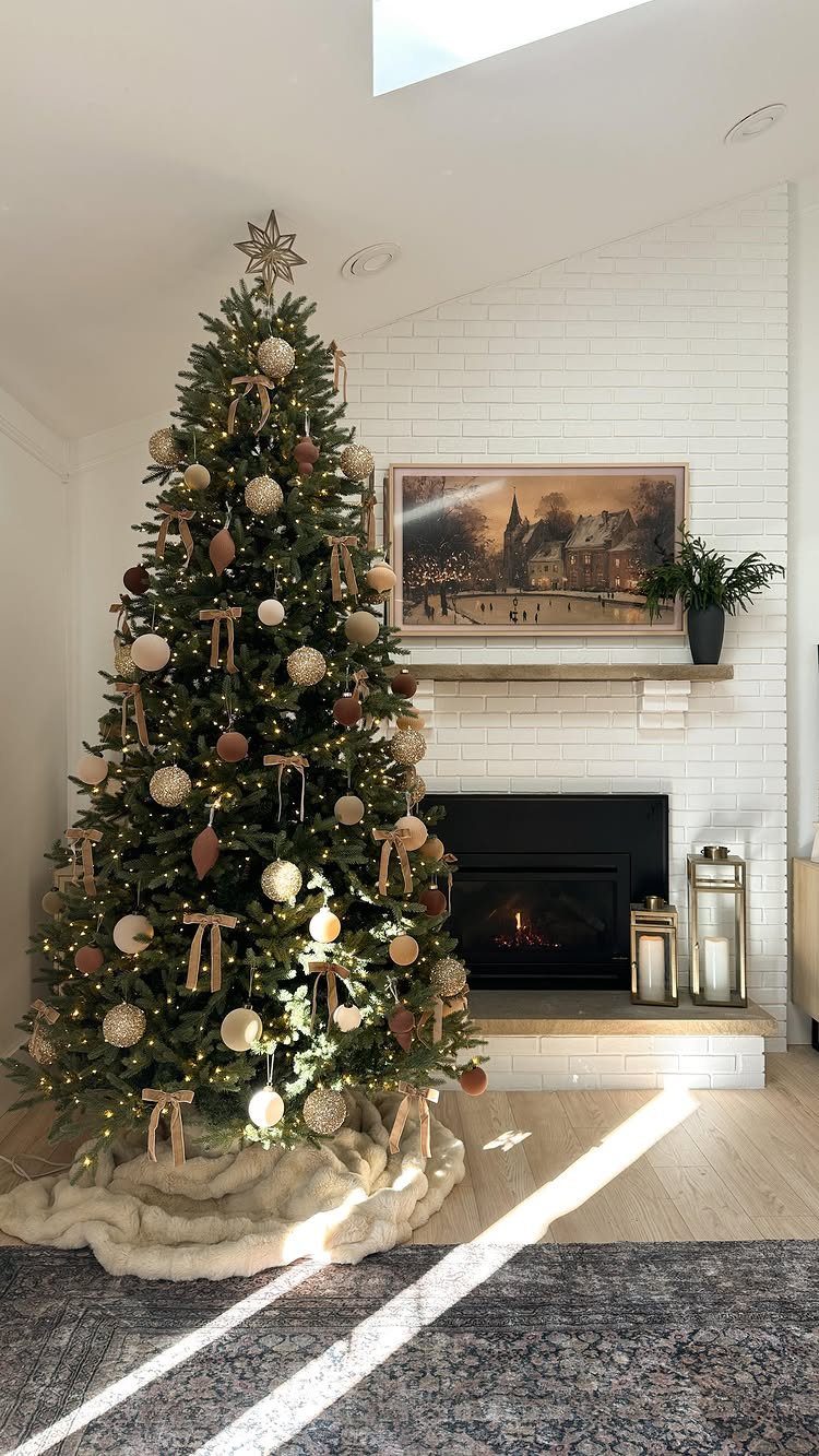10 Neutral Color Christmas Decor Ideas for a Cozy Home 9 Decorated Christmas tree with neutral ornaments standing next to a white brick fireplace.