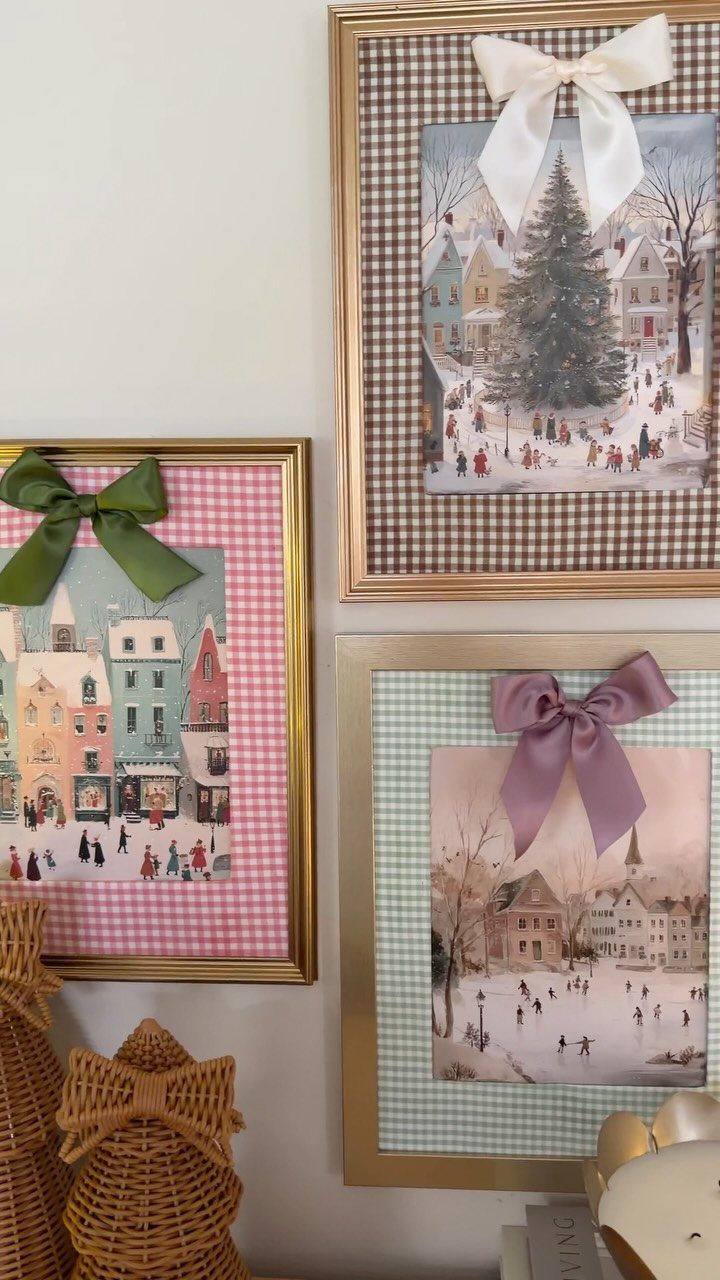 29 New Ideas for Christmas Decorating to Try in 2026 12 Framed winter village art with decorative bows and gingham patterned mats on a wall