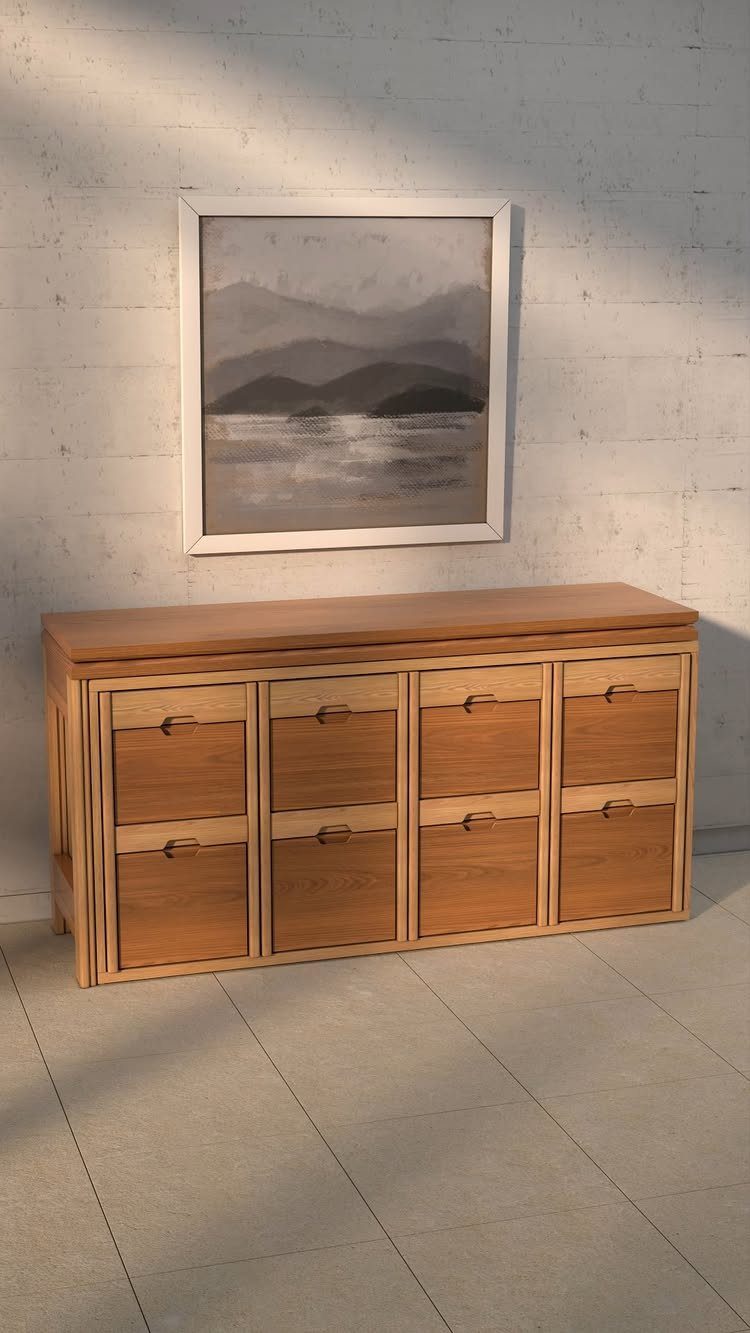 15 Small Living and Dining Room Ideas That Maximize Space 2 Wooden sideboard with drawers and a framed abstract painting on a textured wall.