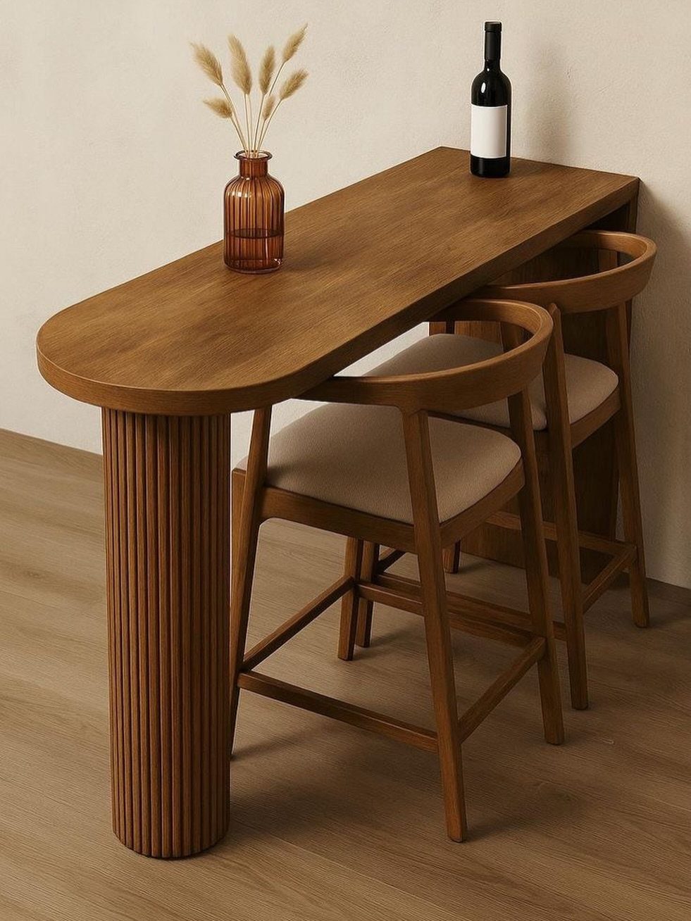 15 Small Living and Dining Room Ideas That Maximize Space 4 Oval wooden dining table with two matching chairs and a bottle of wine.