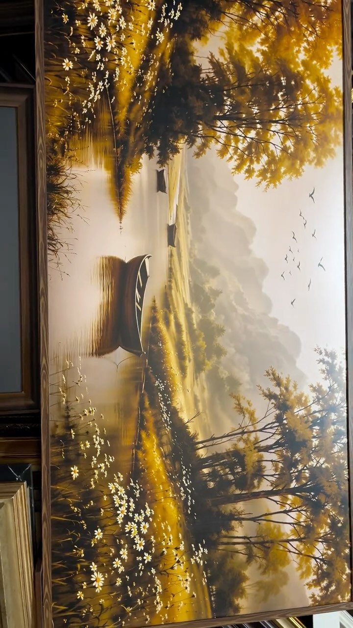 Landscape painting of a boat on a river with golden autumn trees.